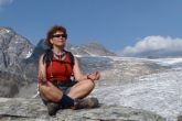 Jenny meditating in Easy Pose (Sukasana) with Chin Mudra along the Abbot Ridge Trail, Glacier National Park, B.C. (Photo by Ian Hatter)