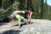 Ian and Jenny in Double Plank Pose (Yugalaka Adho Vitiyasana) near the Giant Steps along the Paradise Valley Trail, in Banff National Park, Alberta (Photo by Gwen Smiley).