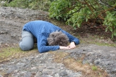 Jenny in a Restorative Child’s Pose (Balasana) near the summit of Mount Tzouhalem, Vancouver Island, B.C. This version helps to open the hips and relax the upper back, shoulders, neck and arms (Photo by Ian Hatter).